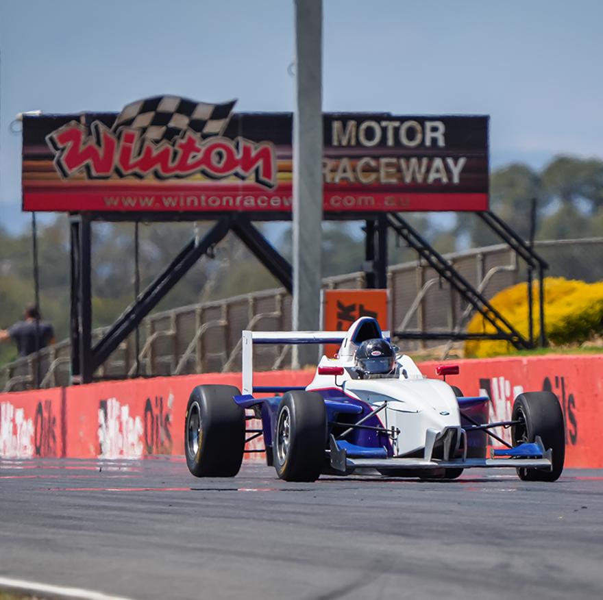 Front view of Giuliano's Formula BMW on track at Winton